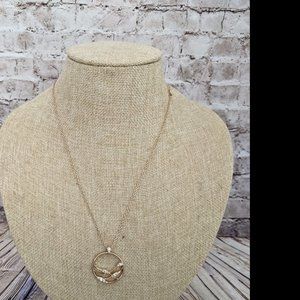 Gold And Diamante Swirl Circle Necklace